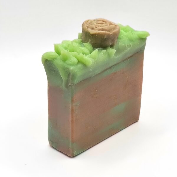 Evelyn Rose Handmade Soap with soft pink and white swirls, surrounded by fresh rose petals, creating a luxurious and elegant vibe. Perfect for those seeking a timeless, floral fragrance and natural skincare