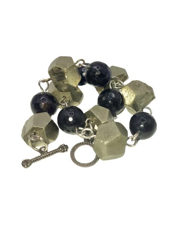Handcrafted Black Onyx and Pyrite bracelet with natural stones, promoting protection, healing, abundance, and spiritual growth for emotional stability and prosperity