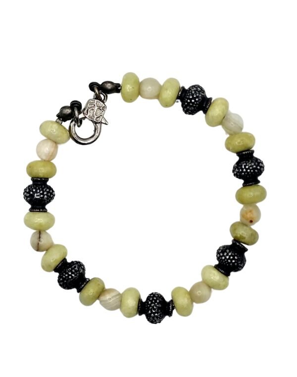 Handcrafted Mexican White Onyx and Andean Green Opal bracelet, promoting stability, emotional healing, renewal, and motivation with natural gemstones.
